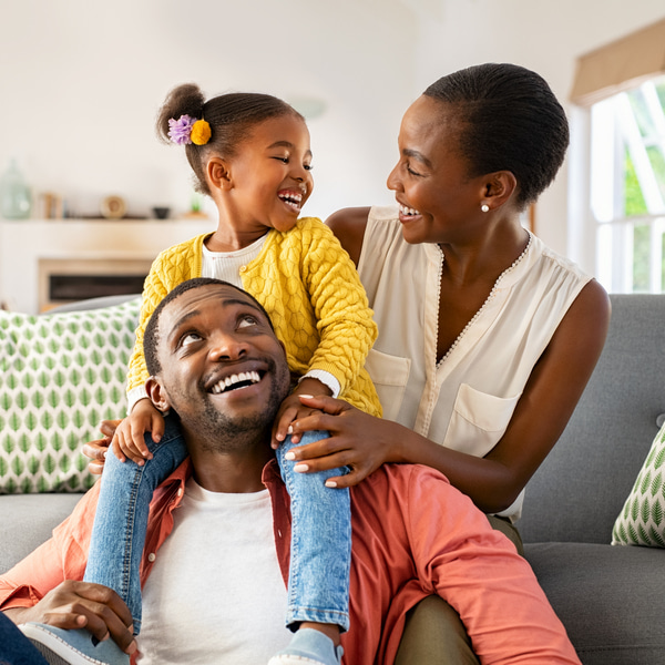 Elevating Health, Smiles, and Self-Assurance! A happy familly smiling