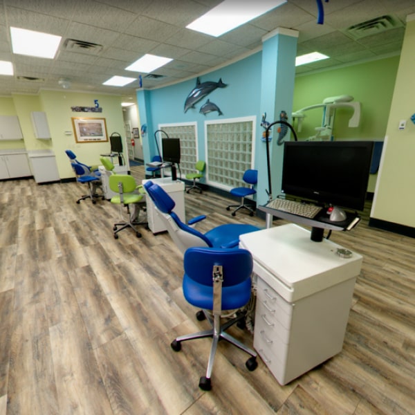 Pediatric Dentistry of Romeo | Compassionate Pediatric Dental Care in Romeo, MI Our Romeo pediatric office showing its equipment and colorful chairs